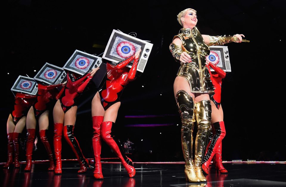  Katy appeared to be in full warrior-woman mode in thigh-high gold boots and metallic sleeves