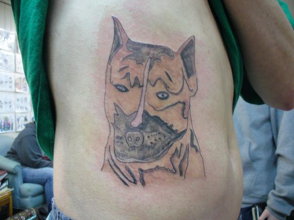  One of several awkward dog tatts featured in the gallery