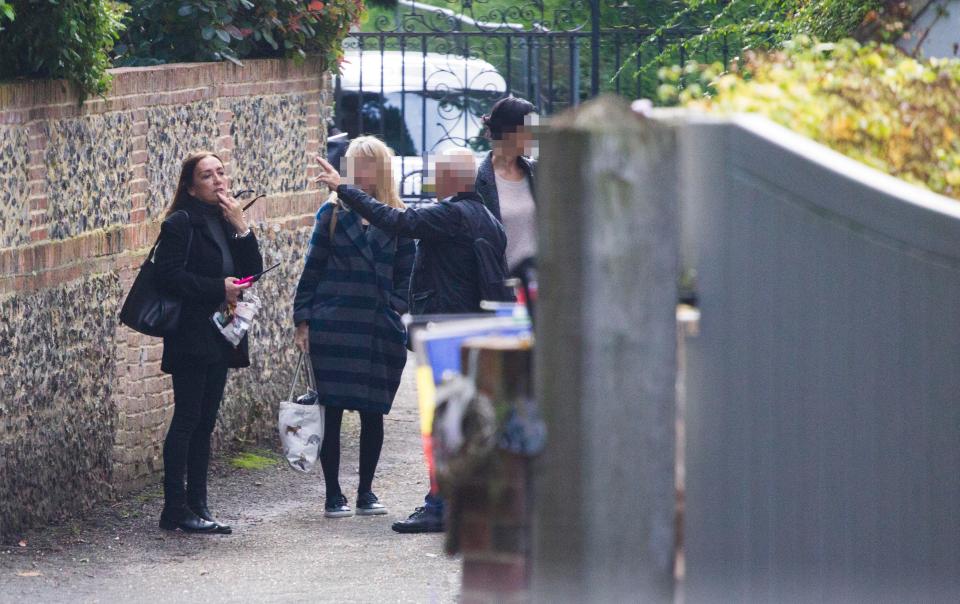  Nu Findlay chats to fans outside George Michael's home