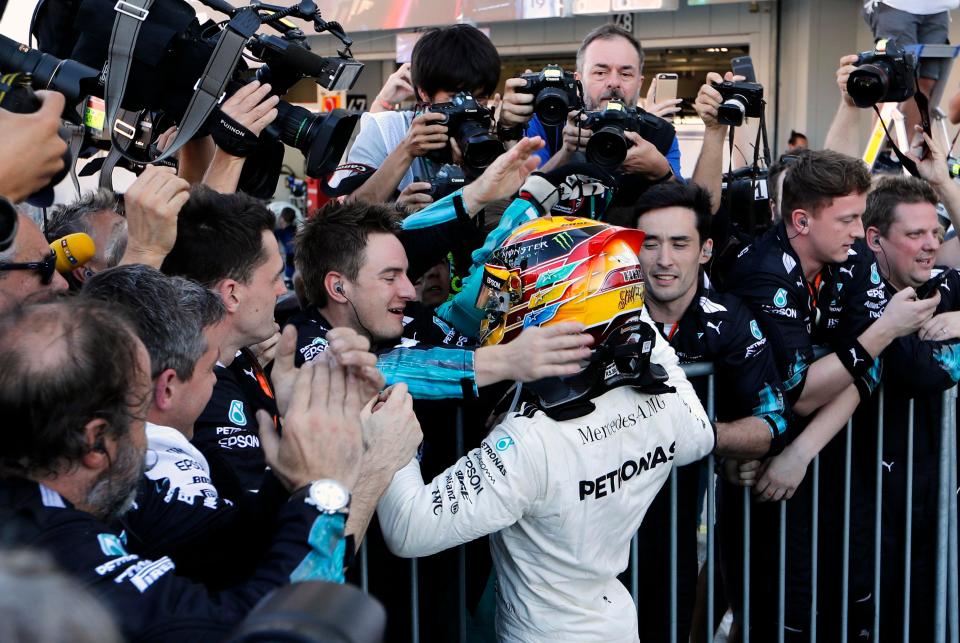 Hamilton celebrates after Vettel's engine trouble handed him a brilliant opportunity