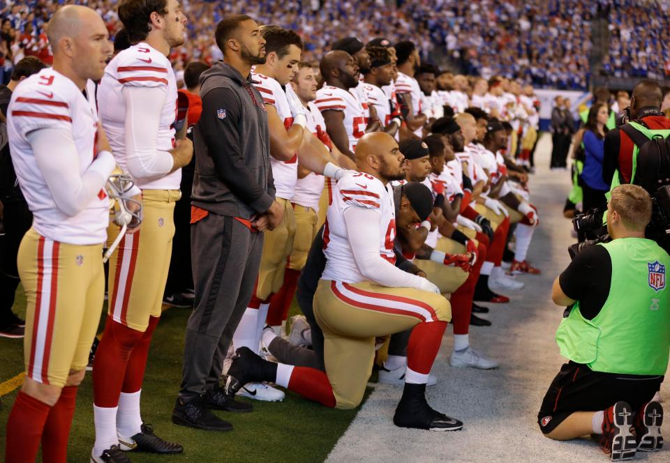  Around 20 San Francisco 49ers players took a knee during the national anthem