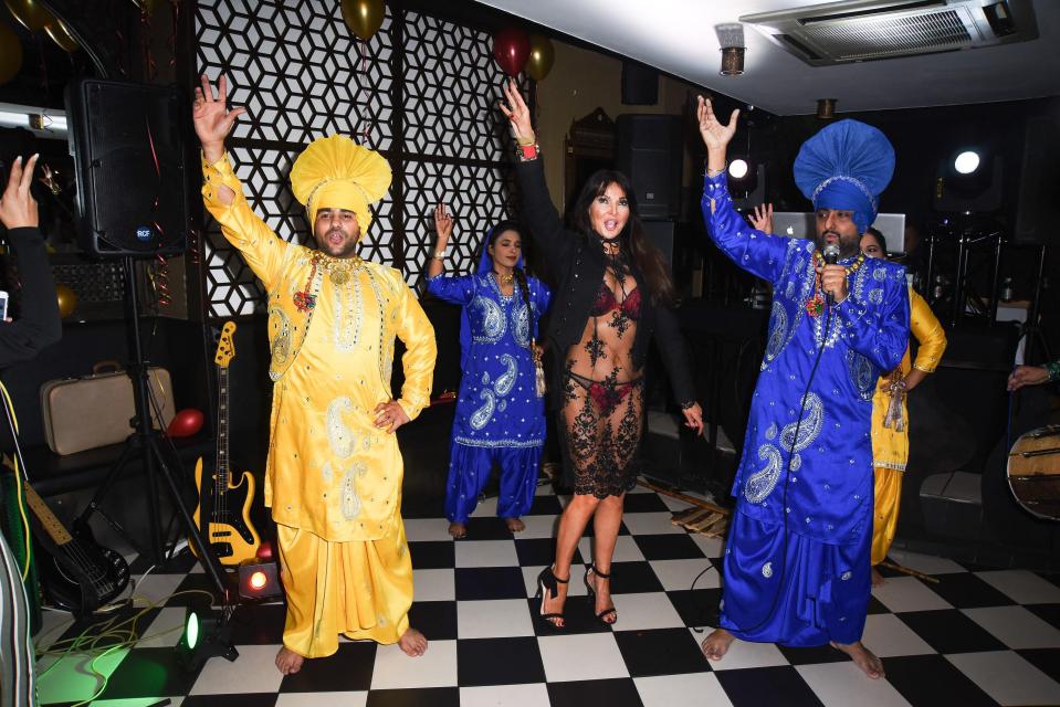  Lizzie danced the night away at Indian restaurant anniversary party