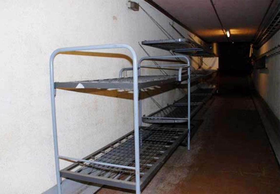  Corridors are lined by bunk beds that would be used in times of nuclear attack