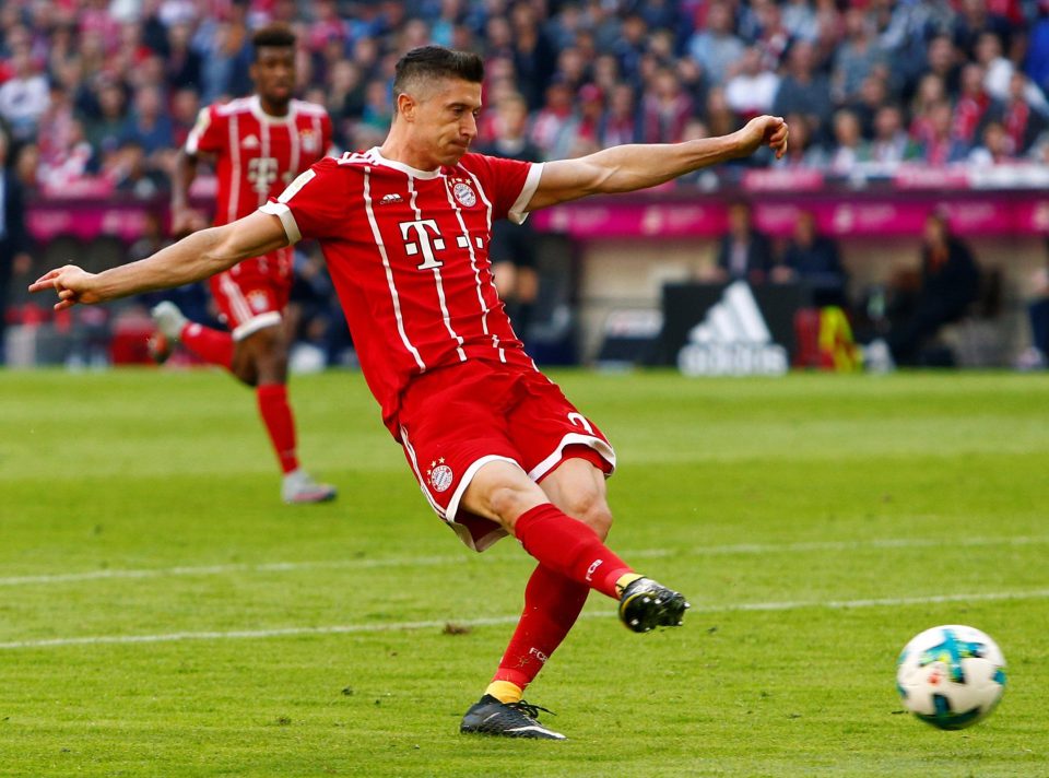 Robert Lewandowski slides home a simple fourth goal for German giants Bayern Munich