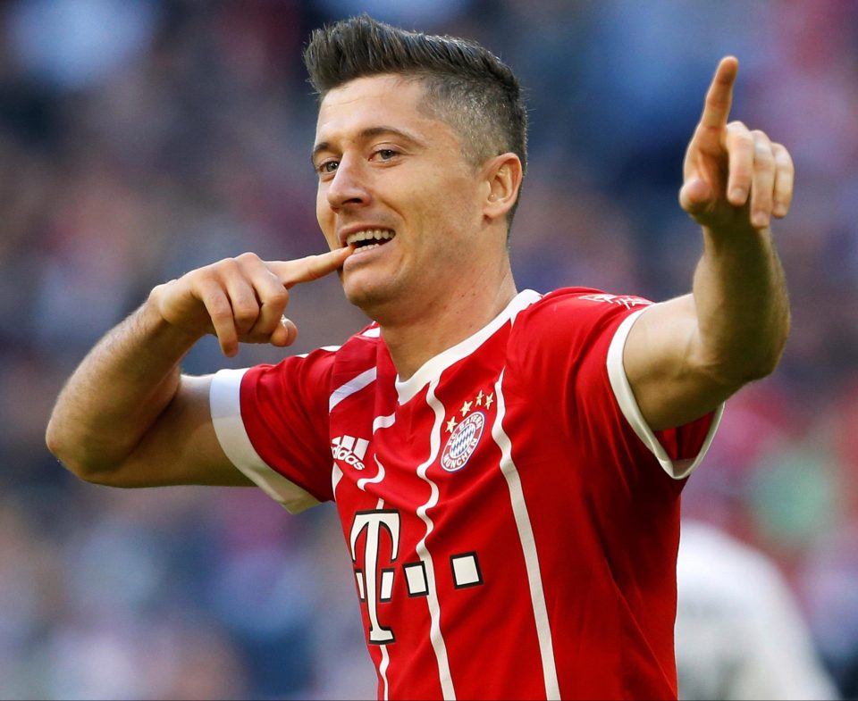 Robert Lewandowski salutes his goal as Bayern run amok late on