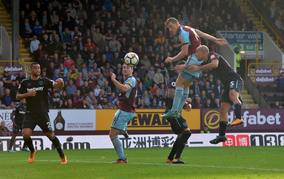  Chris Wood scores a towering header to grab an equaliser for Burnley