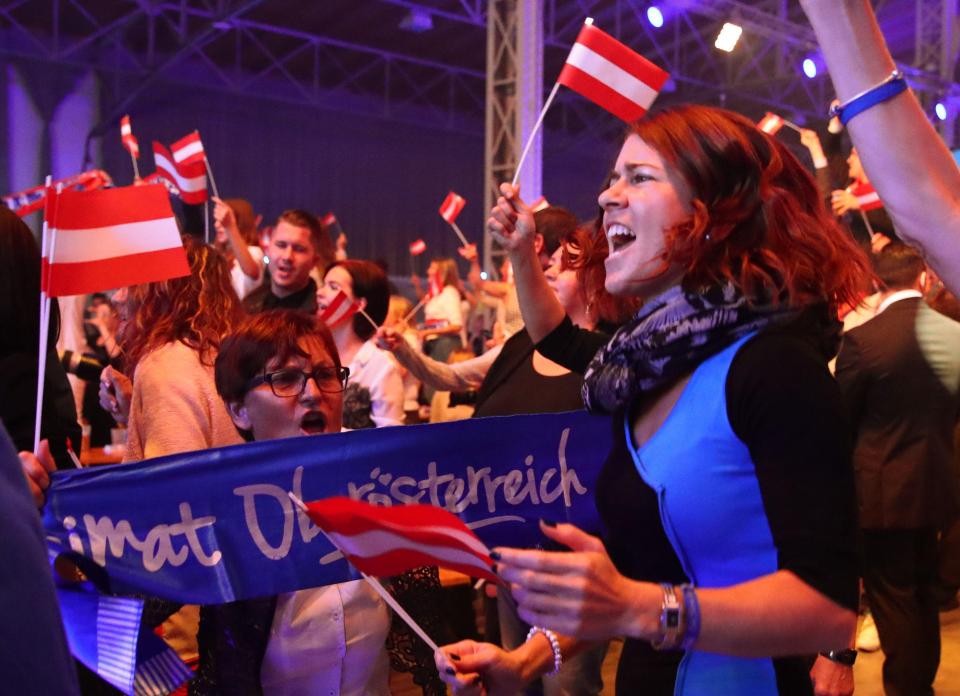  Supporters of far-right Freedom Party (FPOe) celebrate the party's outcome in the general election during a party meeting in Vienna