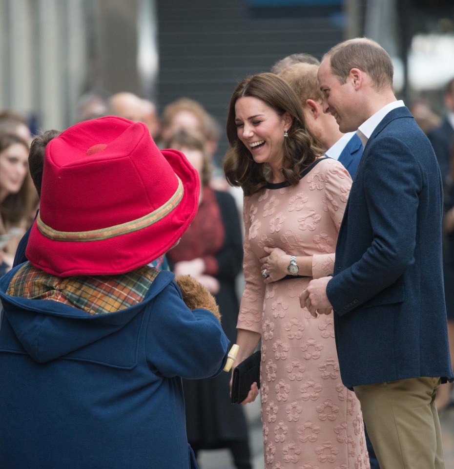 The Duchess of Cambridge met Paddington Bear at Paddington Station in London yesterday