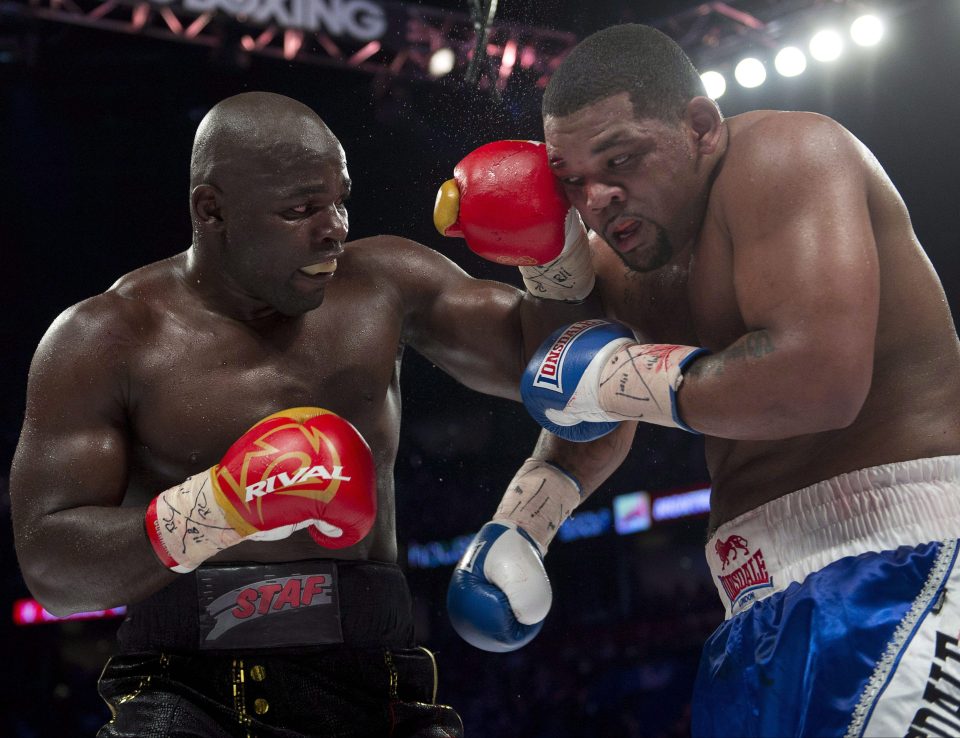 Carlos Takam, left, likes to be on the front foot and will bring the fight to Anthony Joshua