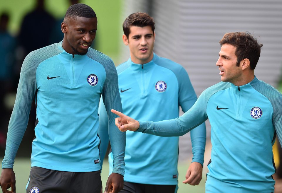  Tiemoue Bakayoko, Alvaro Morata and Cesc Fabregas warm up ahead of Chelsea's game with Roma