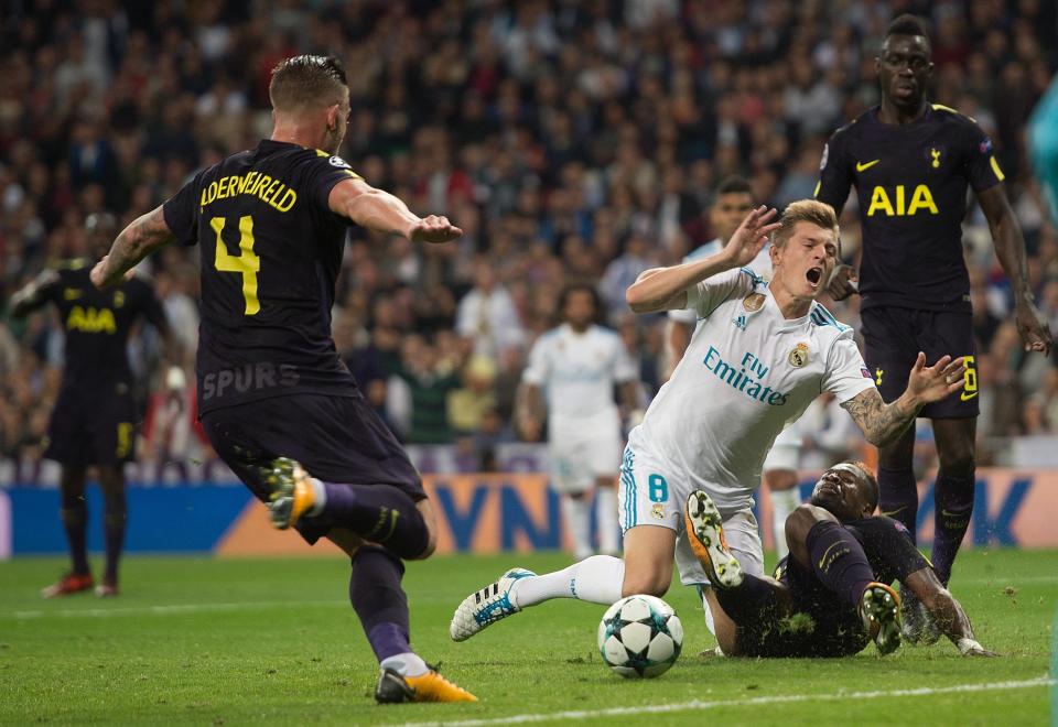 Toni Kroos is brought down by Serge Aurier for the Real Madrid penalty