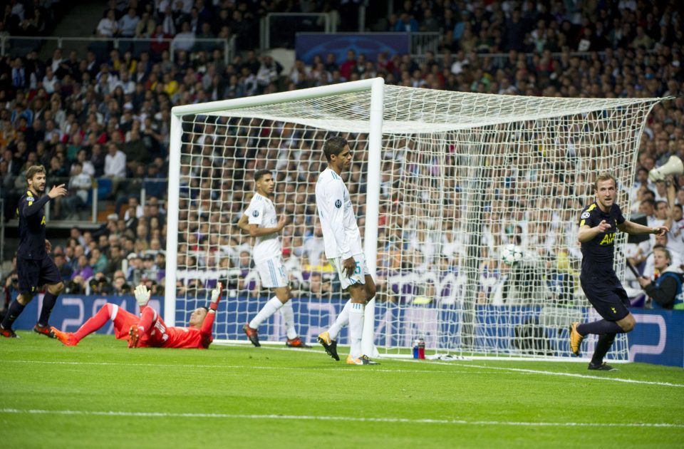  Kane wheels away after Raphael Varane scored an own-goal