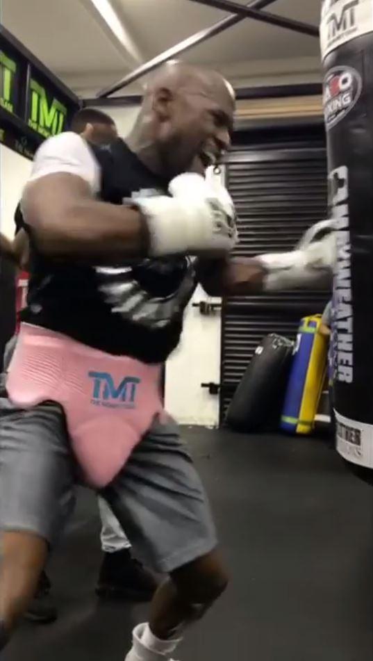  Floyd Mayweather gives the punch bag some leather in a boxing gym