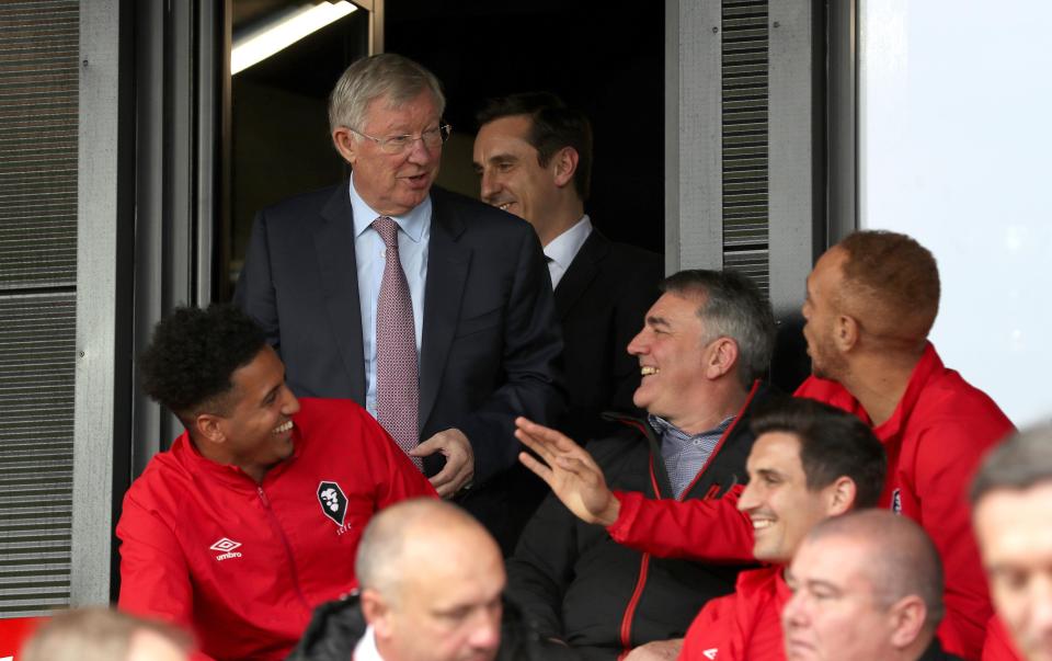  Sir Alex Ferguson chats Salford City players at the unveiling