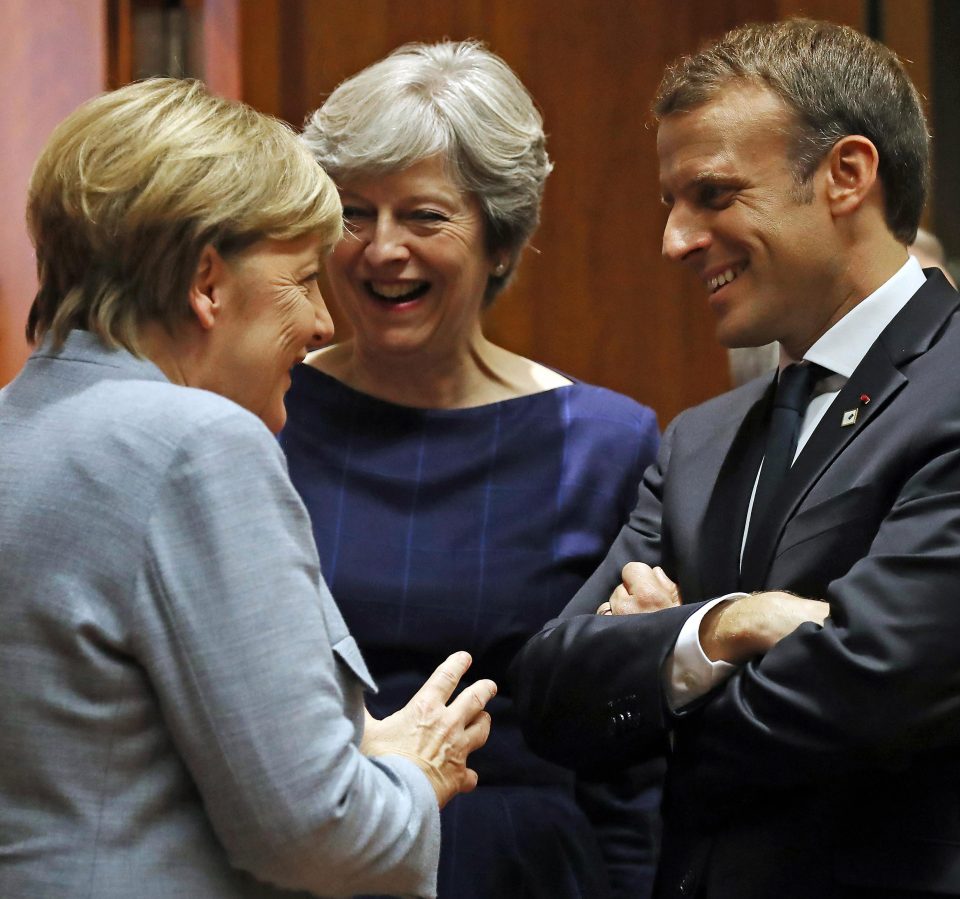  Angela Merkel and Emmanuel Macron gave her a very public show of support