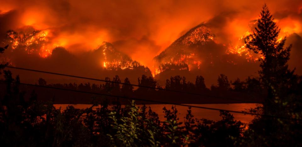  A wildfire burns in the Columbia River Gorge