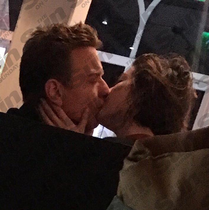  Married actor Ewan McGregor shares a kiss with Mary Elizabeth Winstead in a London cafe