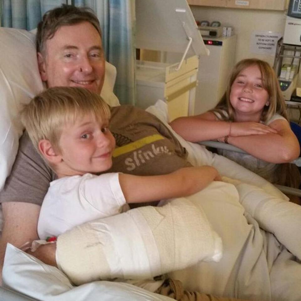  Christ with two of his children after the operation