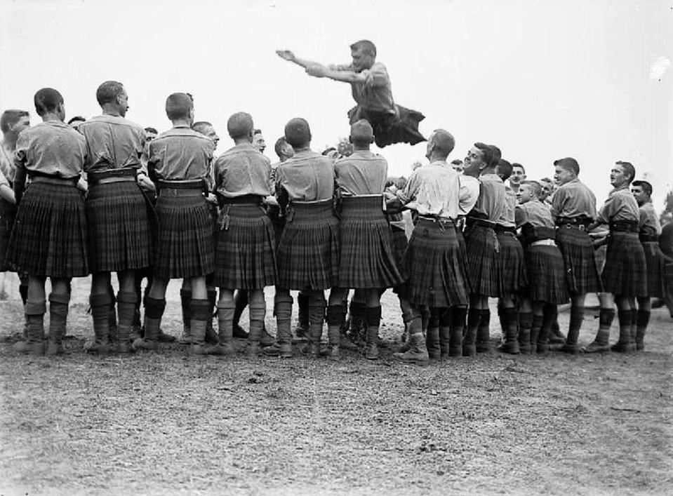  Men of the 9th Battalion, Highland Light Infantry, playing rugby in France, August 1917