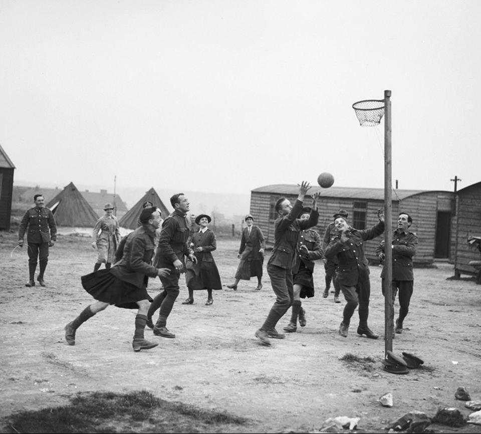  Members of the Women's Auxiliary Army Corps and convalescent soldiers playing basketball at Etaples, France, May 1918