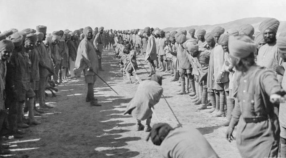  Men of the 45th Sikhs play tug-of-war, 1918, during World War One