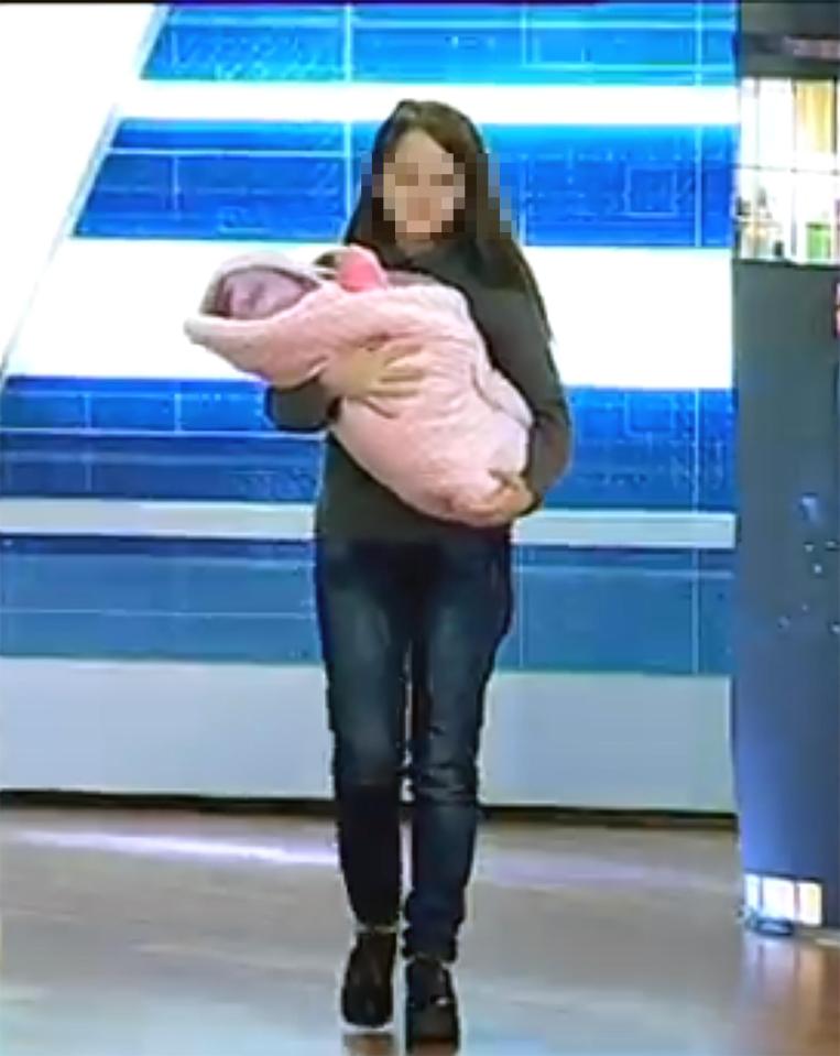  The girl, from a small town in Ukraine, pictured on the sick twisted reality TV show with her baby