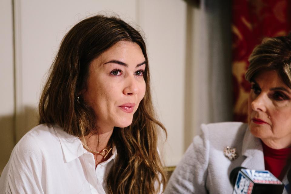  Mimi Haleyi, left, sits with attorney Gloria Allred, right, during a press conference where Haleyi detailed an alleged sexual assault by movie producer Harvey Weinstein in New York