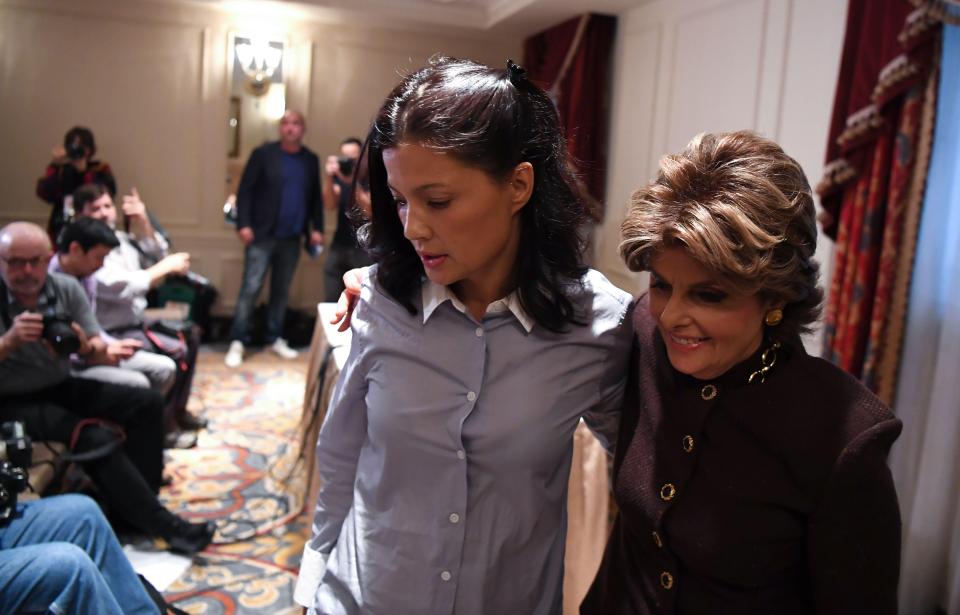 The actress is led out of her press conference by lawyer Gloria Allred 