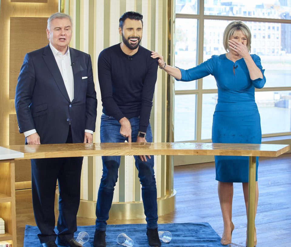  Ruth couldn't stop laughing as Rylan joked that it looked like he was 'having a wee' as the water spilled off the table