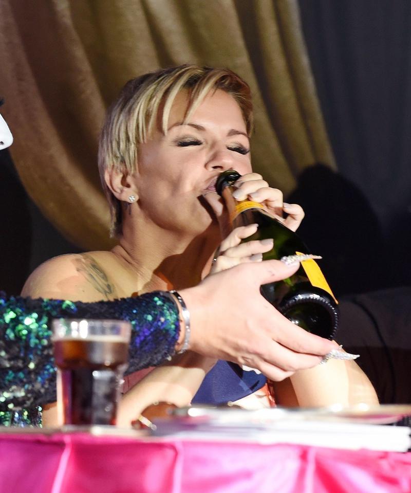  Kerry Katona appears to drink booze from the bottle while judging a drag queen competition in Manchester