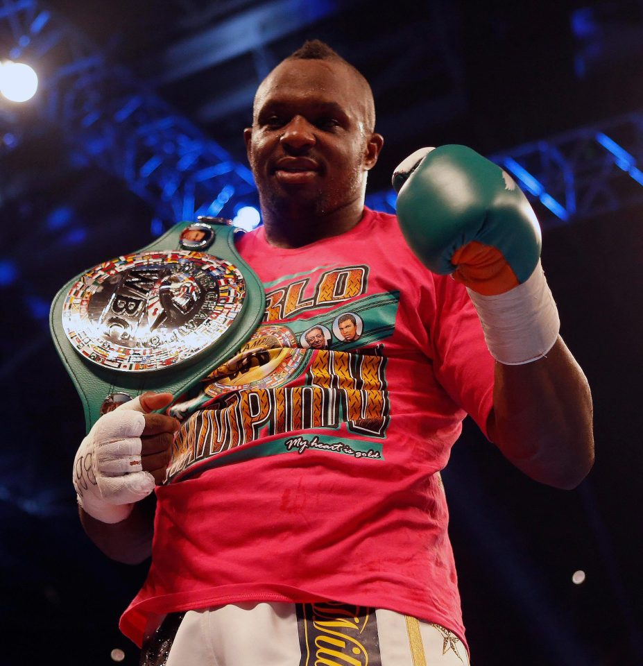  Dillian Whyte celebrates with the WBC silver belt after beating Robert Helenius