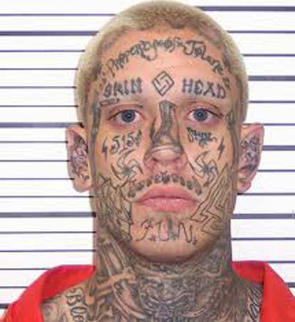  The extremely tattooed face of jailed killer Curtis Allgier includes white supremacist declarations and swastikas