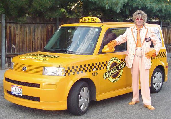  Randall Fowler, pictured at work as a Rod Stewart impersonator, claims their father 'destroyed' his life