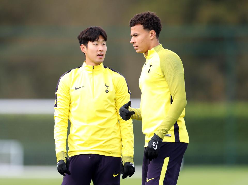  Heung-min Son and Dele Alli share some words