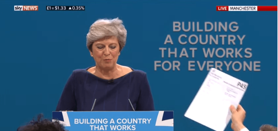  Lee Nelson hands Theresa May her P45 at the Tory Conference.