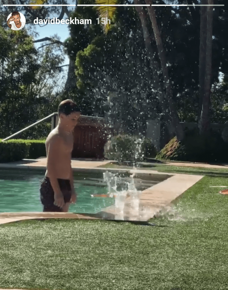  Cruz Beckham had no problem with the game as he relaxed in his family's pool at their home in LA