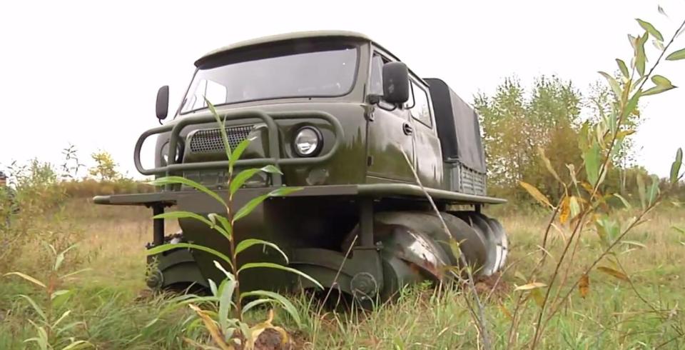  The screws turn in opposite directions to propel the truck forward