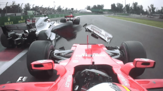  This image shows the moment when Lewis Hamilton and Sebastian Vettel clashed