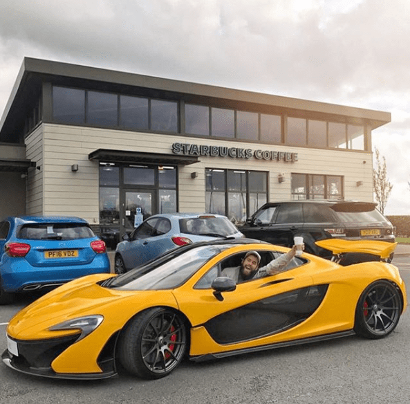  Tom worked up a sweat while driving the McLaren P1 through a Starbucks drive-through