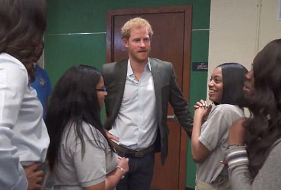  Prince Harry chatted with students about pizza while visiting Hyde Park Academy in Chicago with Michelle Obama