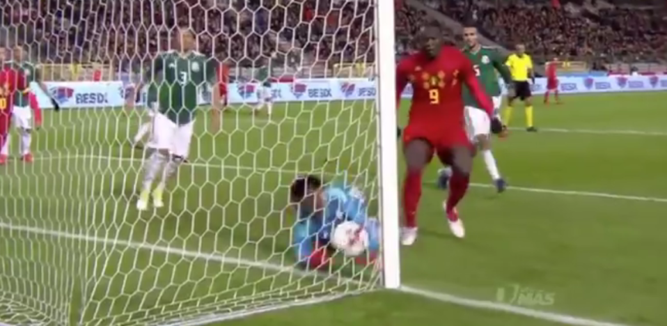  Eventually the ball bundles over with the Mexico keeper beaten