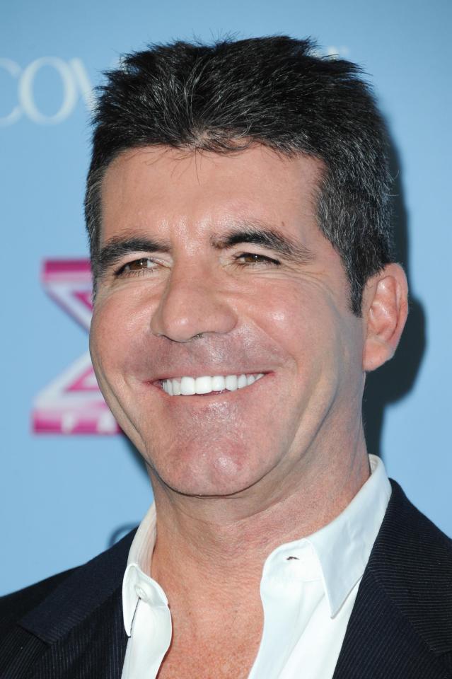  Still smiling . . . music mogul Simon Cowell