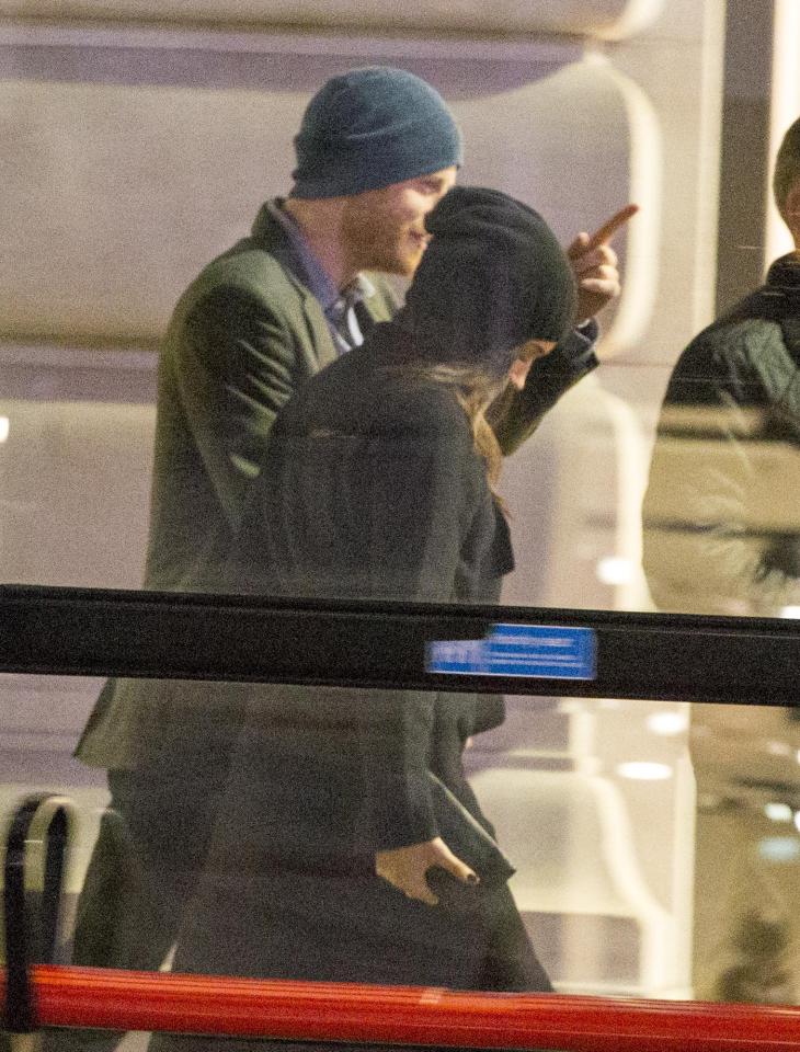  Harry and Meghan wore his-and-hers beanie hats as they admired the festive lights along Piccadilly on a London date night