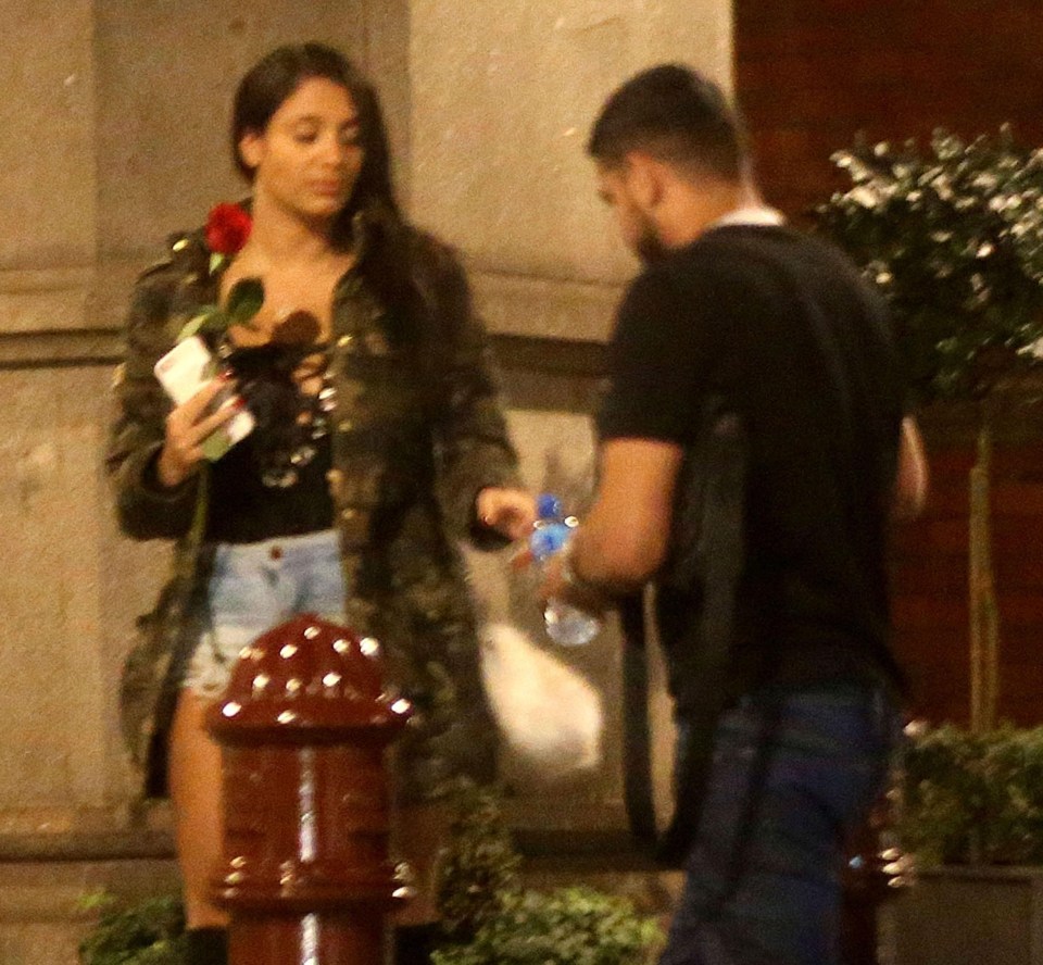 Amir Khan is pictured with a mystery woman on a night out in London