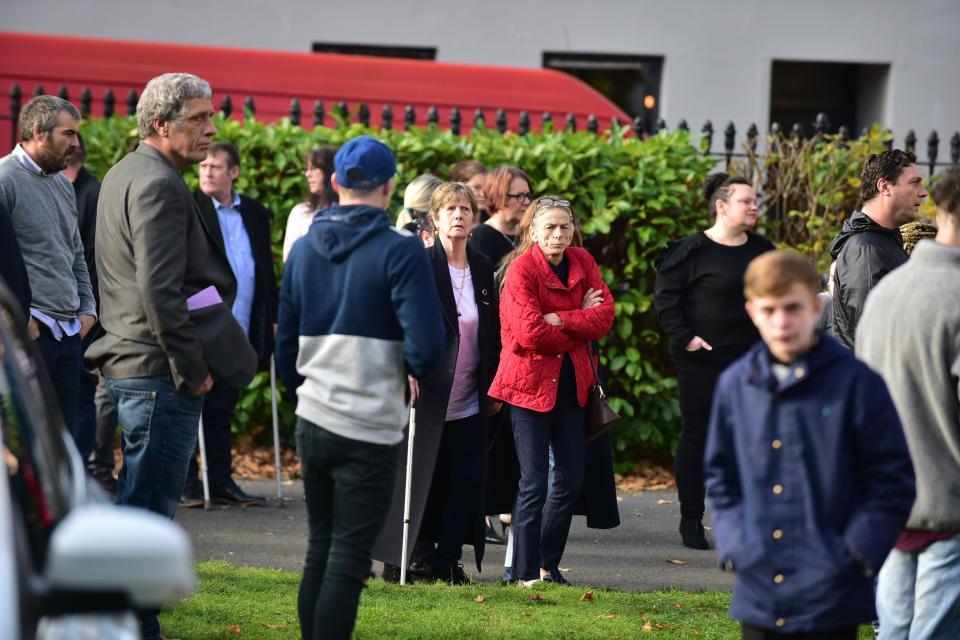 People gathered on Friday morning to see the procession pass through Jesse's hometown of Gloucester