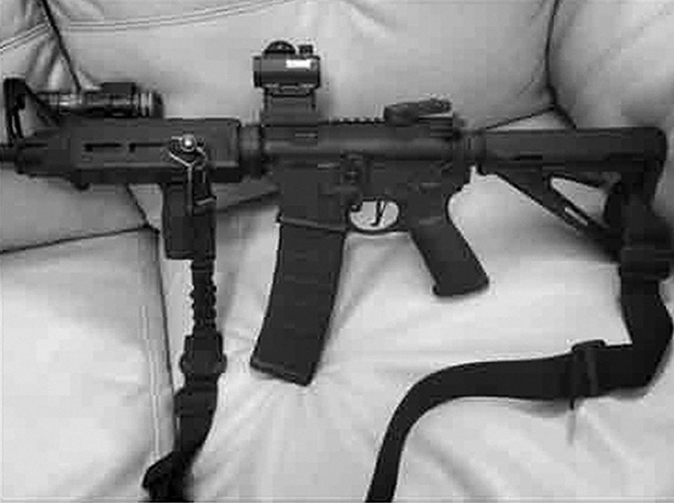  Pictured is a photo of an AR-15 he posted on his Facebook page