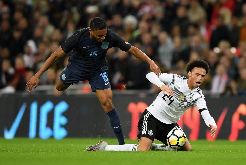  Liverpool defender Joe Gomez and Leroy Sane battle for possession of the ball