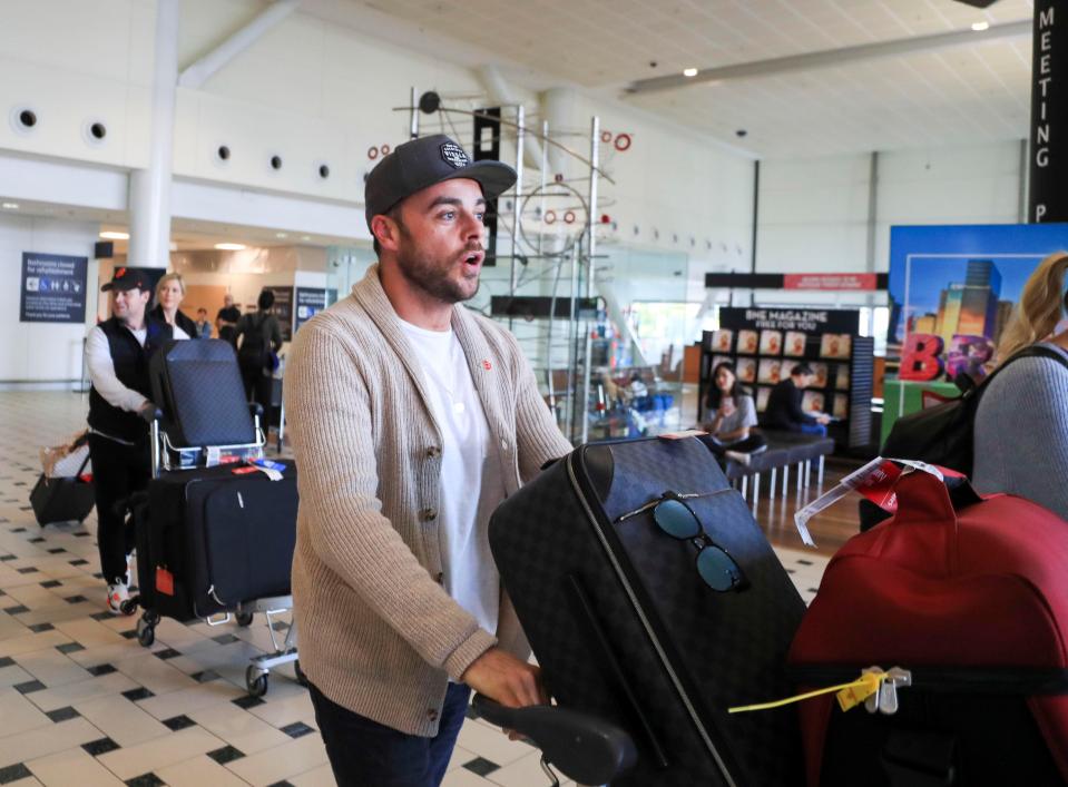  During his flight over, Ant posed for pictures with fans