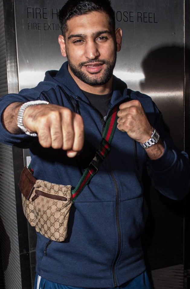 Amir looked ready to rumble as he arrived at Brisbane airport