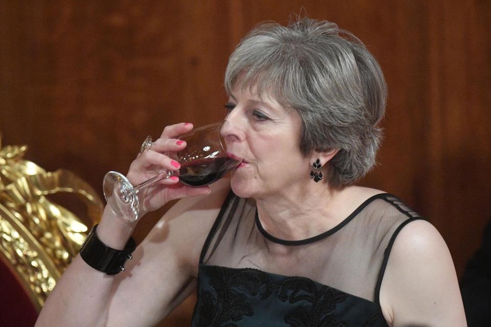  Theresa May enjoys a glass of wine after her attack on Russia